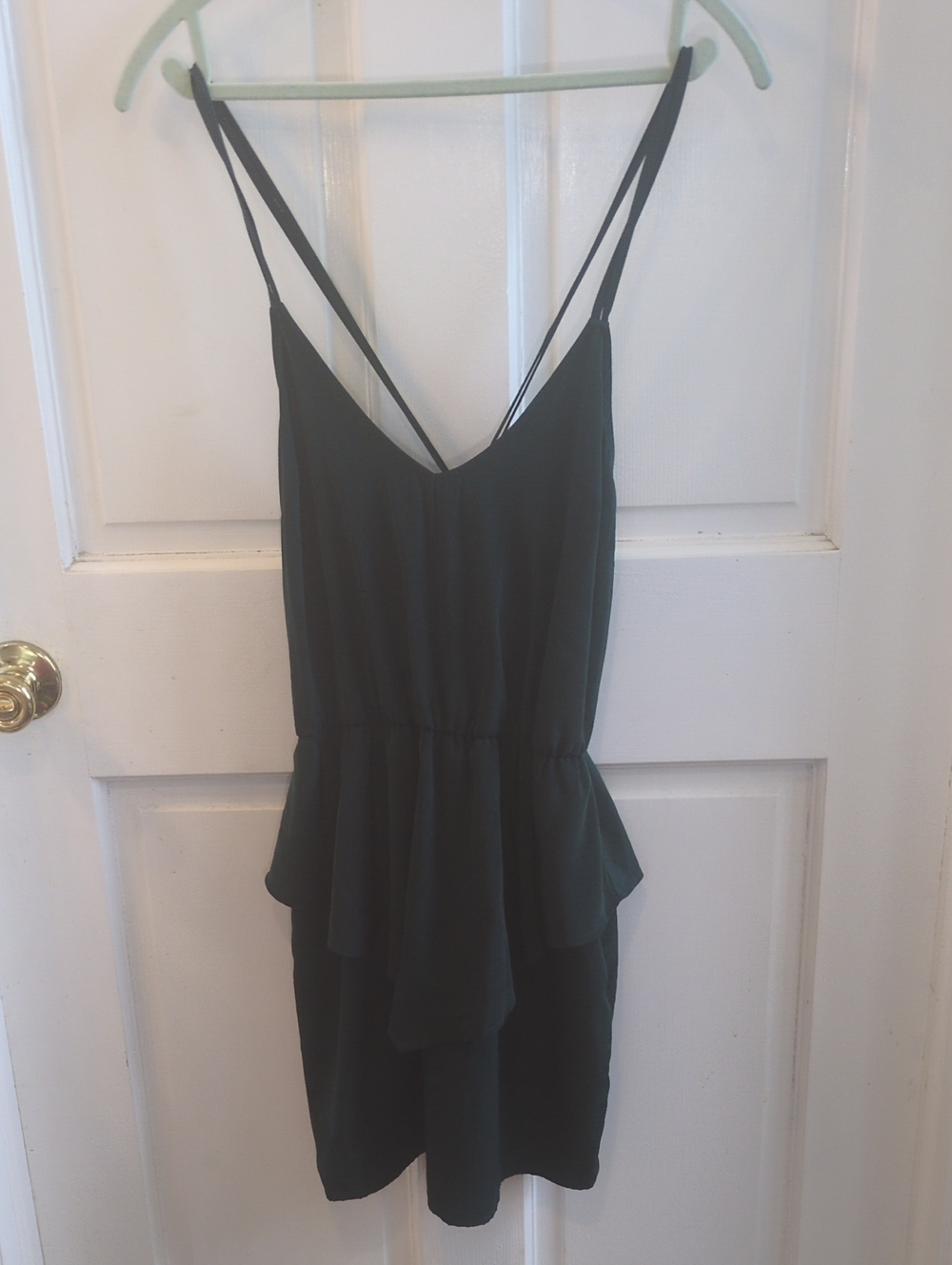 Solemio Sleeveless Emerald Green Peplum Mini Dress with Tie-Back